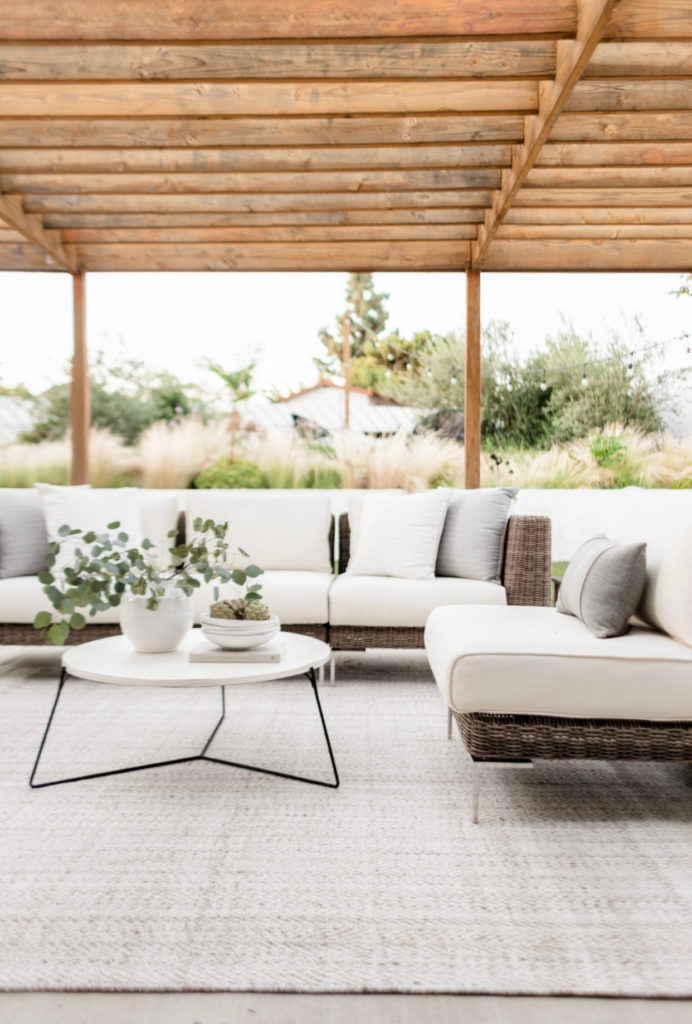 Our Backyard Patio Details - Halfway Wholeistic; Click to see backyard patio on Halfway Wholeistic! We renovated our backyard a few years ago by adding a new stucco wall, wood pergola, concrete patio and fresh landscaping! Backyard landscaping designs layout outdoor living. Backyard patio designs layout landscapes. Backyard patio ideas outdoor areas decks. Backyard patio designs layout landscapes. Patio ideas on a budget backyard wood. Patio ideas decorating back porches. Backyard patio decorating ideas back porches. 