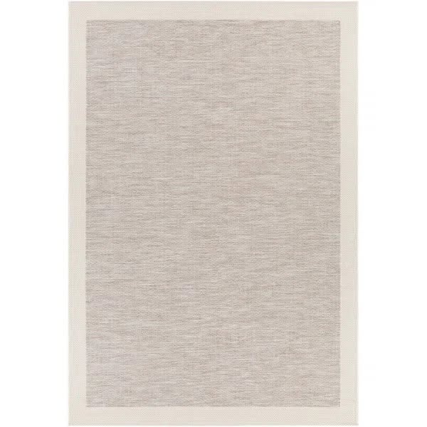 Light neutral area rug with a border from Joss & Main